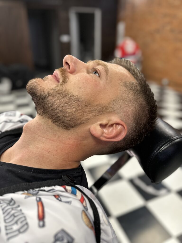 Men's standard haircut and fade performed at The Faithful Barber & Co barbershop. Barber in Aylmer Ontario.